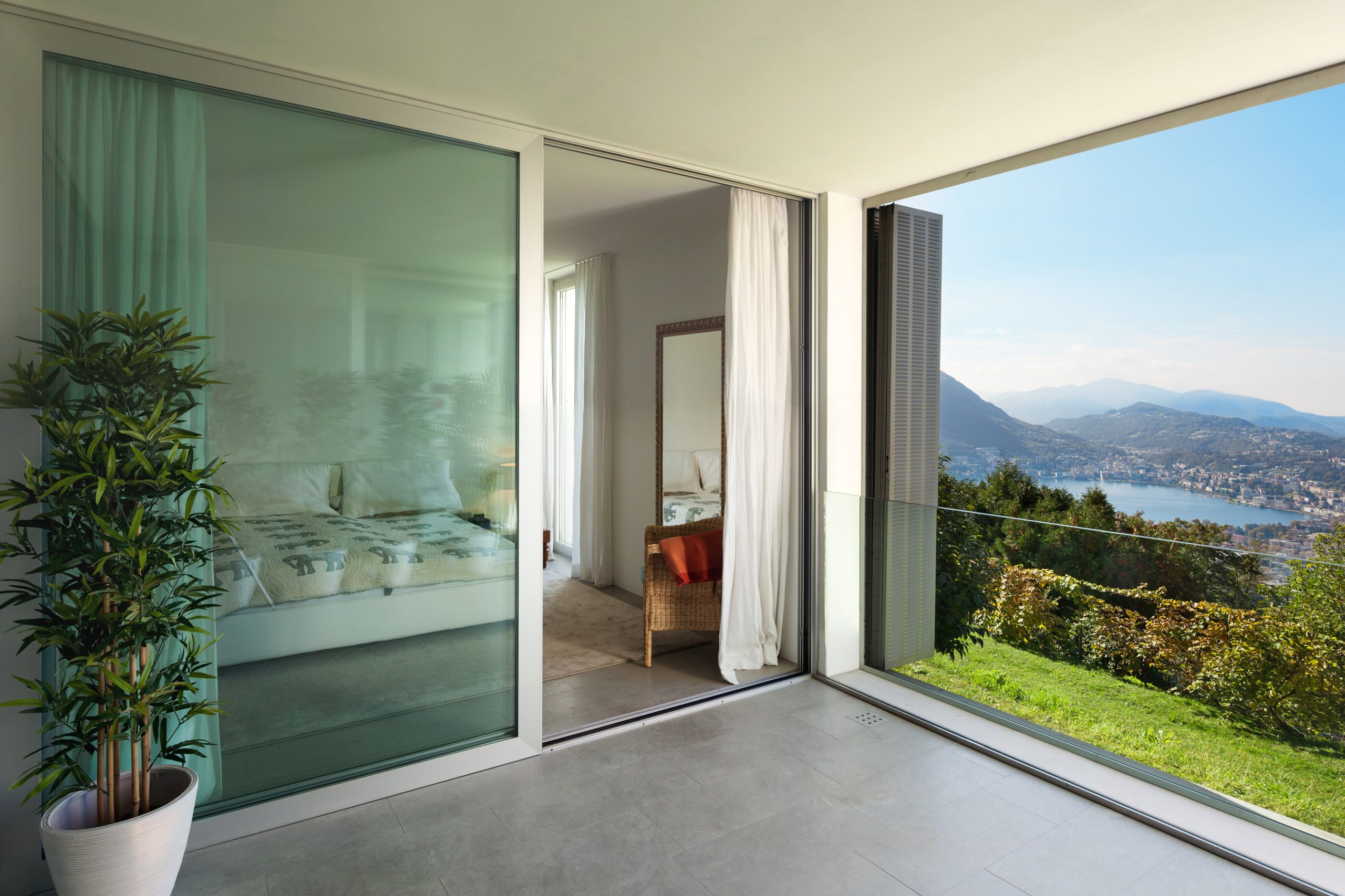 Interior of a modern house,Â balcony overlooking the lake